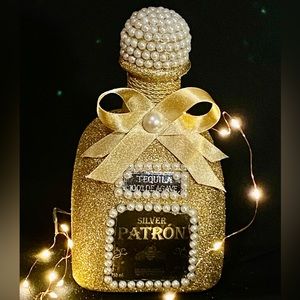 Glamorous glittered decorative tequila bottle.